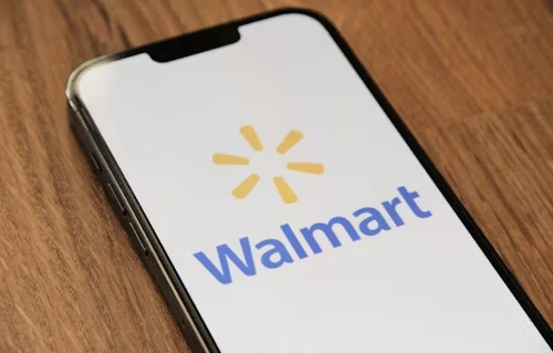 Smartphone with the Walmart logo on the screen