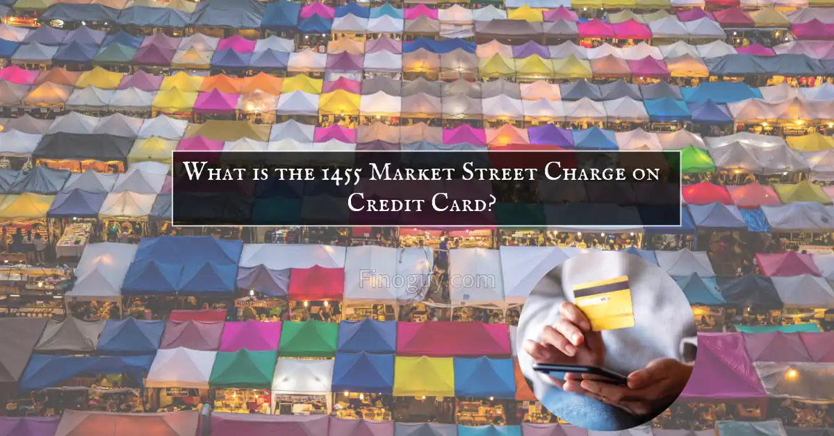 A person holding a credit card in their right hand and a smartphone in their left hand. They are standing in front of a field of colorful tents. text on the top What is the 1455 Market Street Charge on Credit Card?"