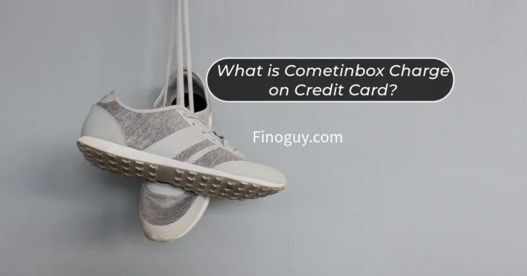 A pair of gray sneakers hang from a string in front of a white brick wall with text that says "What is Cometinbox Charge on Credit Card?" Finoguy.com is written below the text.
