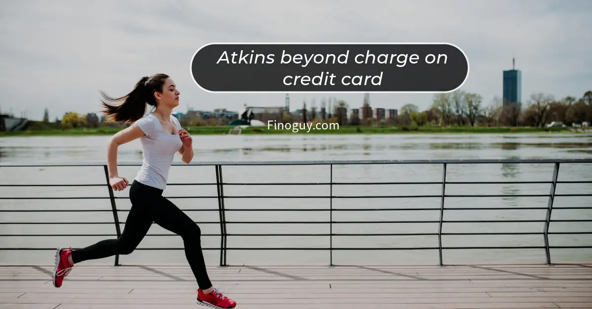 Women running river in background and with the text Atkins beyond charge on credit card" on it
